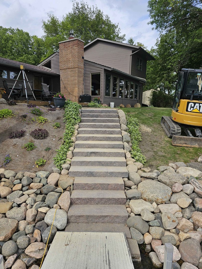 Granite steps from dock up to lakehouse